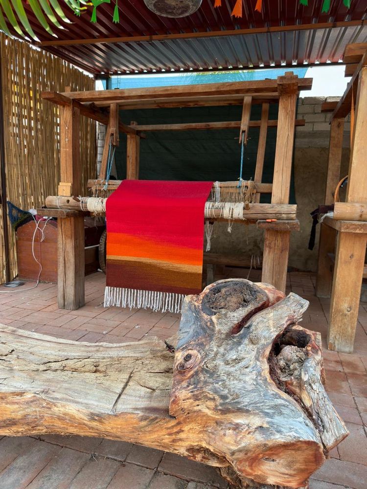 Tapete degradado en el telar al aire libre